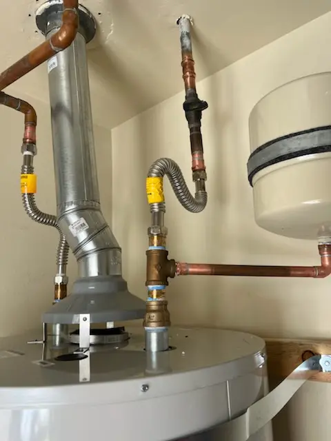 Water heater installation and plumbing repair in Summit